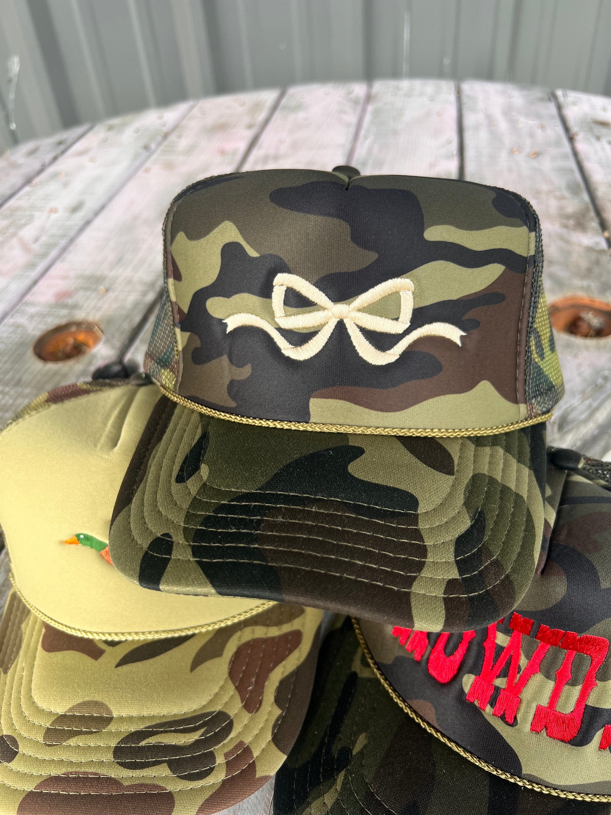Shipping Dept. Coquette Bow Embroidery - Solid Camo Otto Trucker Hat