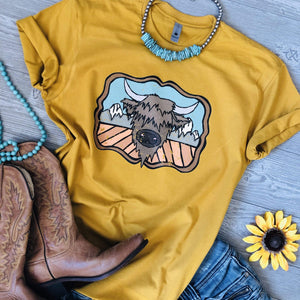 Shipping Dept. "HIGHLAND COW and the MOUNTAINS" on MUSTARD - THE ROAMING SAGUARO COLLECTION by Meghan Wolff