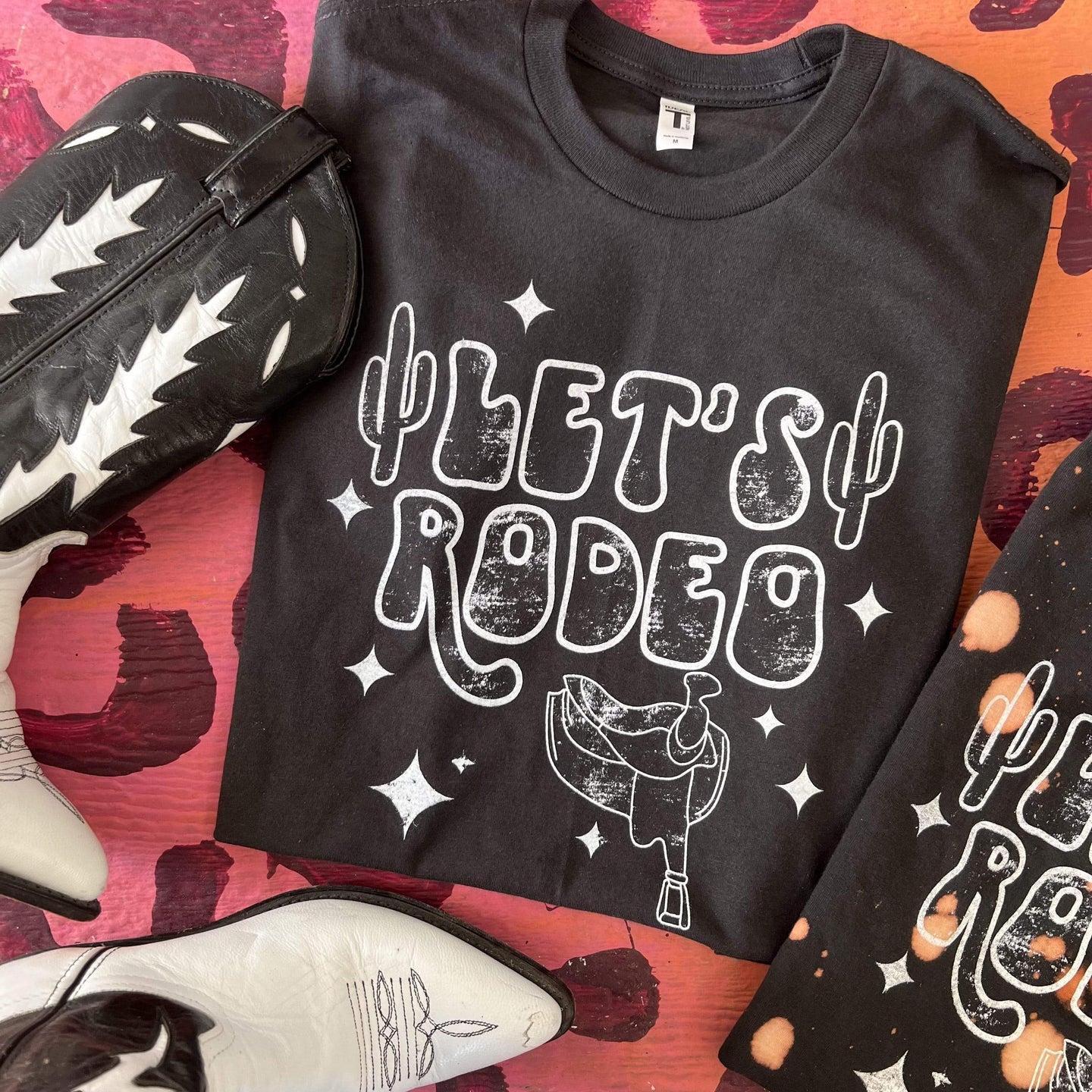 MISSMUDPIE Let's Rodeo with stars and saddle - Black Tee