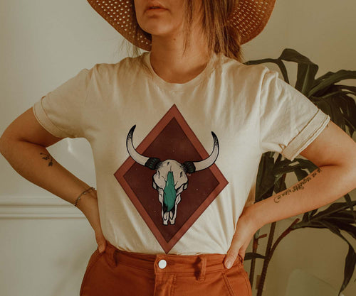 Shipping Dept. Turquoise Cow Skull CREAM T-Shirt - THE ROAMING SAGUARO COLLECTION by Meghan Wolff